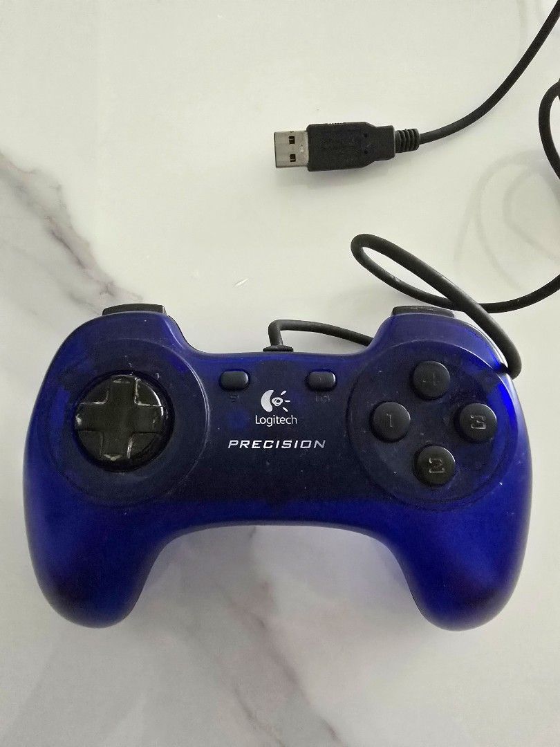 Logitech Precision (Category: Controllers) located in Singapore. Submitted by wal_che (Listing ID 1357241946, Image 1). Description: Wired controller for pc games. Well maintained. Selling away cause not using..