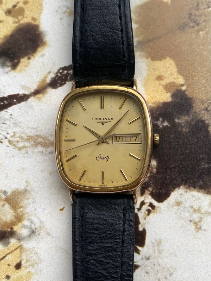 Longines Tonneau (Category: Luxury Watches) located in Pasig City. Submitted by watchtradeph (Listing ID 1357279963, Image 3). Description: Thank God it’s Viernes. Featured item is a vintage Longines dress watch in a rare Spanish language Day-Date. Longines [WT 1141-0 105DS] Quartz Circa: 1980s Size: 25mm x 35mm Strap: genuine Longines leather and buckle Material: gold-plaque All original Newly serviced.