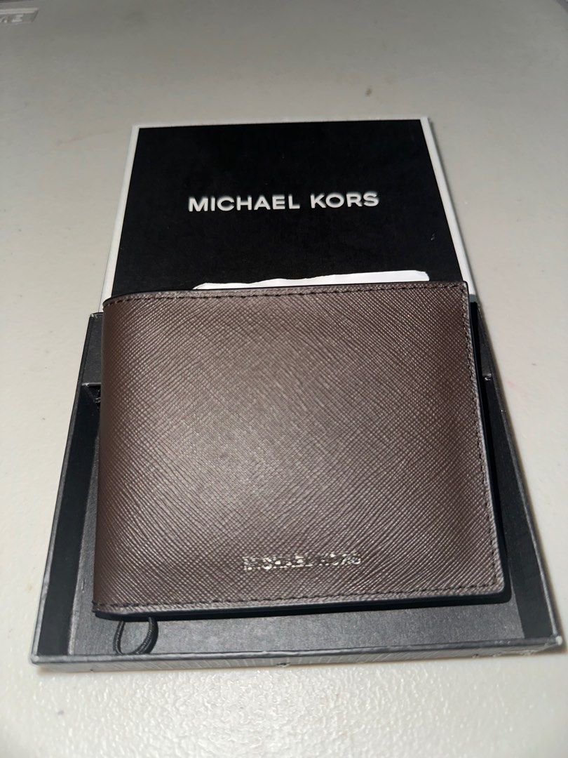 Mk michael kors brown wallet mens (Category: Wallets & Card Holders) located in Baliuag. Submitted by krsf0911 (Listing ID 1357369918, Image 2). Description: Michael Kors brown wallet AUTHENTIC BRAND NEW UNUSED BOUGHT FOR 5K PRICE SLIGHTLY NEGOTIABLE BALIWAG BULACAN CAN DO SHIPPING/MEET UP.