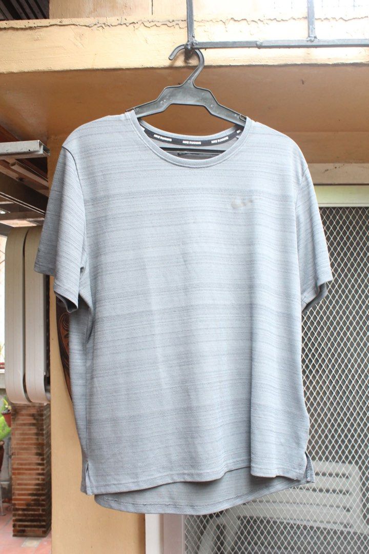 Nike Running Shirt (Category: Tshirts & Polo Shirts ) located in Paranaque City. Submitted by Judee (Listing ID 1357282876, Image 2). Description: For Sale nike running shirt Size:M Note: length is shorter and closer to the waist CHECK OUT MY PROFILE FOR OTHER CLOTHES YOU MAY LIKE.