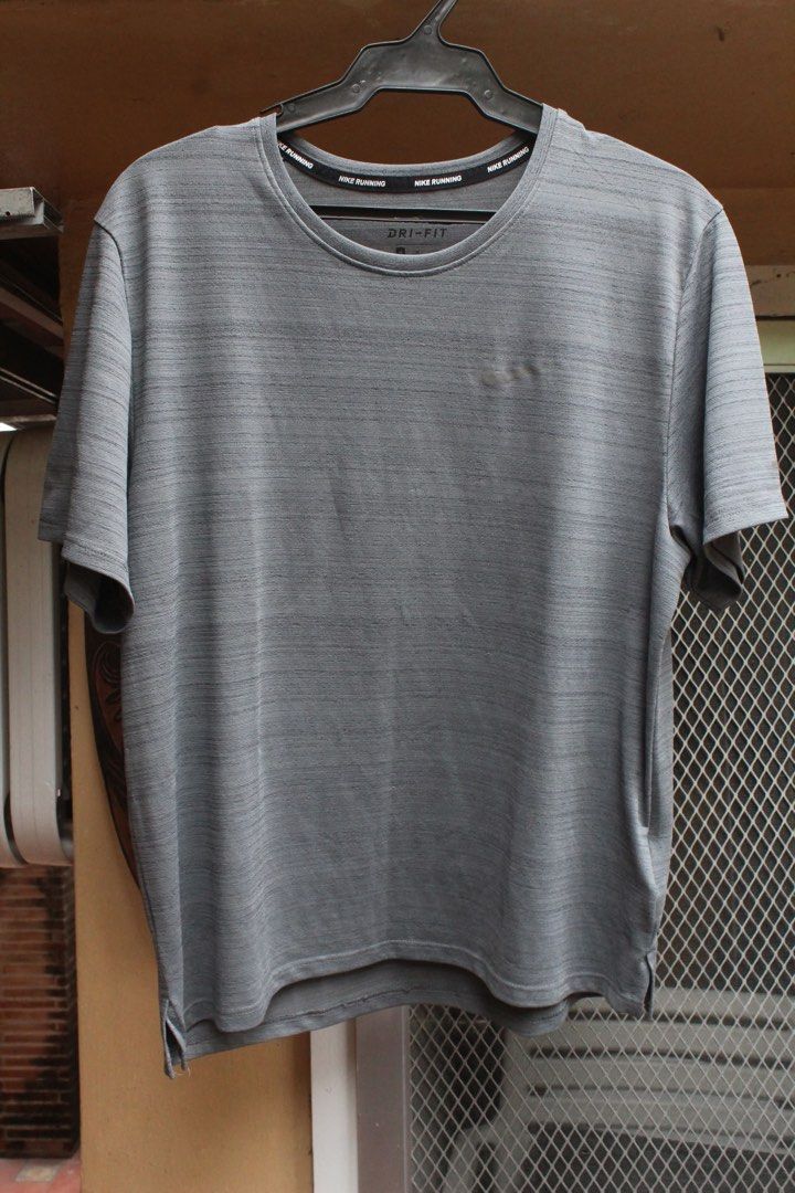 Nike Running Shirt (Category: Tshirts & Polo Shirts ) located in Paranaque City. Submitted by Judee (Listing ID 1357282876, Image 3). Description: For Sale nike running shirt Size:M Note: length is shorter and closer to the waist CHECK OUT MY PROFILE FOR OTHER CLOTHES YOU MAY LIKE.