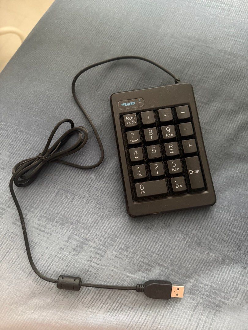 Numeric Keypad (Category: Computer Keyboard) located in Singapore. Submitted by rainbowunicornsarereal (Listing ID 1357284614, Image 1). Description: Mechanical Number keypad, USB connected Lightly used, working condition Selling for $6 Collection at sengkang 544173, or top up for delivery.