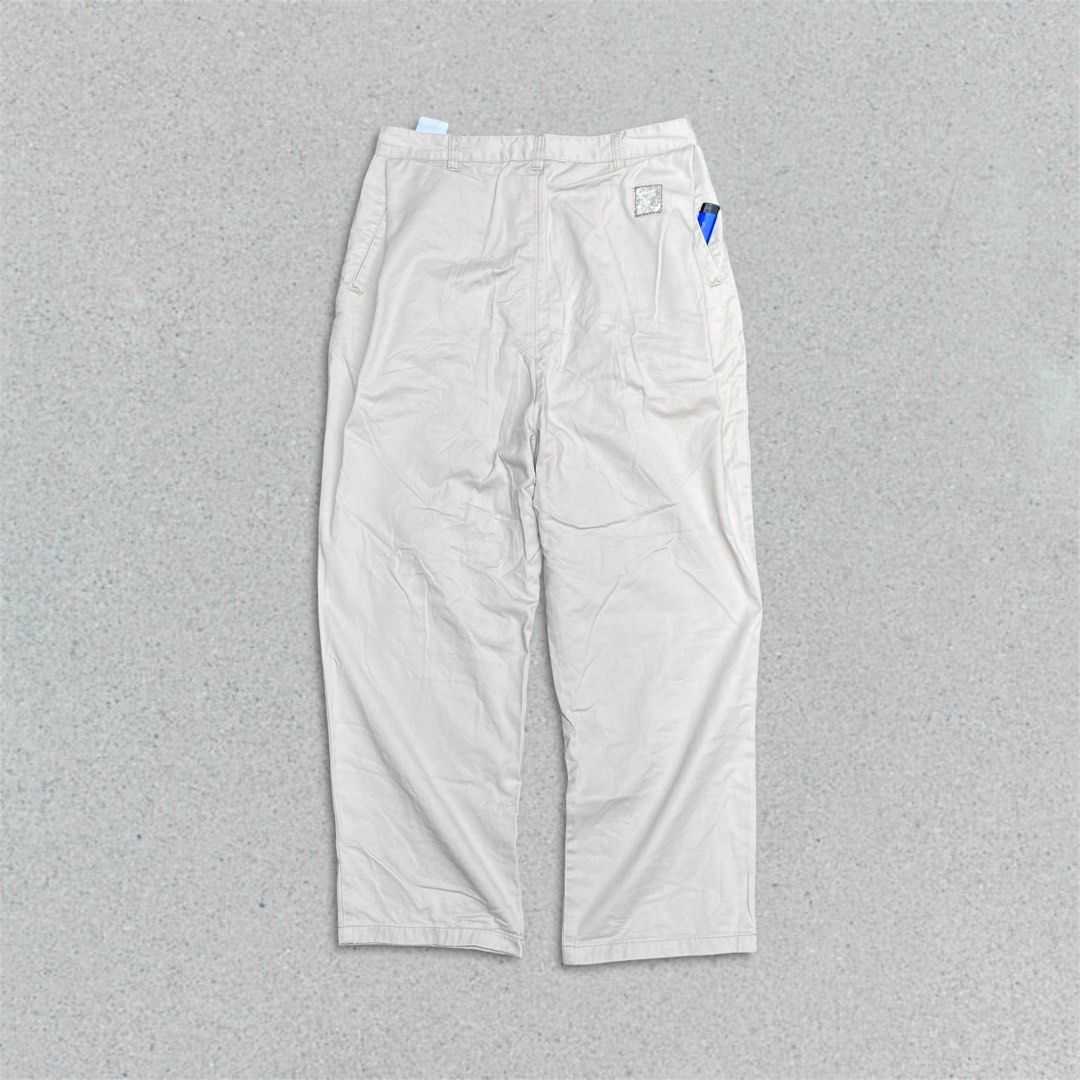 SMOKINGLIFE PLEATED CHINO PANTS (Category: Chinos) located in Balanga. Submitted by faded_garmz (Listing ID 1357200563, Image 3). Description: SMOKINGLIFE PLEATED CHINO PANTS GENERAL NOTE: EXCELLENT CONDITION COLOR BEIGE / EARTH TONE COMPLETE TAGS UNCONVENTIONAL BACK POCKET DESIGN MIRROR EFFECT WITH PLEATED ON POCKETS DESIGN COLOR MAY VARY DUE TO LIGHTING SMKLIFE PATCH DIMENSIONS: WAIST - 32”-34” LENGTH - 40” LEG OPENING - 9” INSEAM - 26” FRONT R