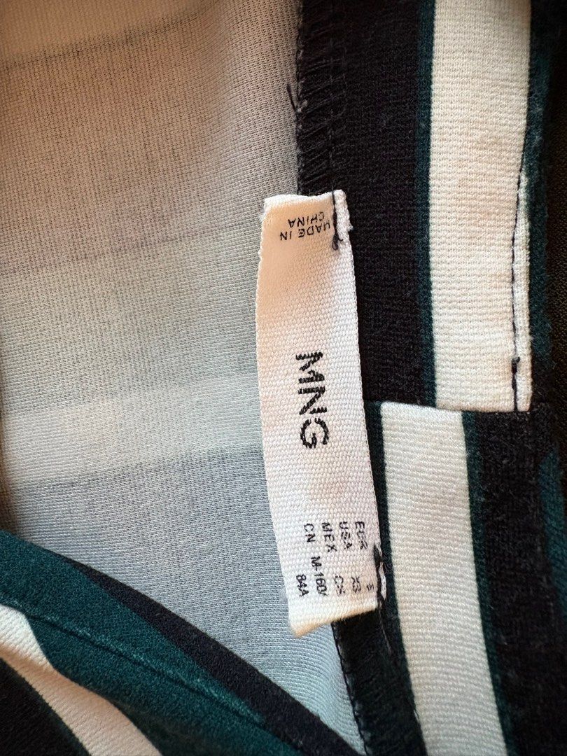 Striped MANGO dress (Category: Dresses) located in Makati City. Submitted by user7633 (Listing ID 1357288244, Image 3). Description: Long sleeved MANGO dress Green, black and white stripes Size: US small but fits up to medium frames.