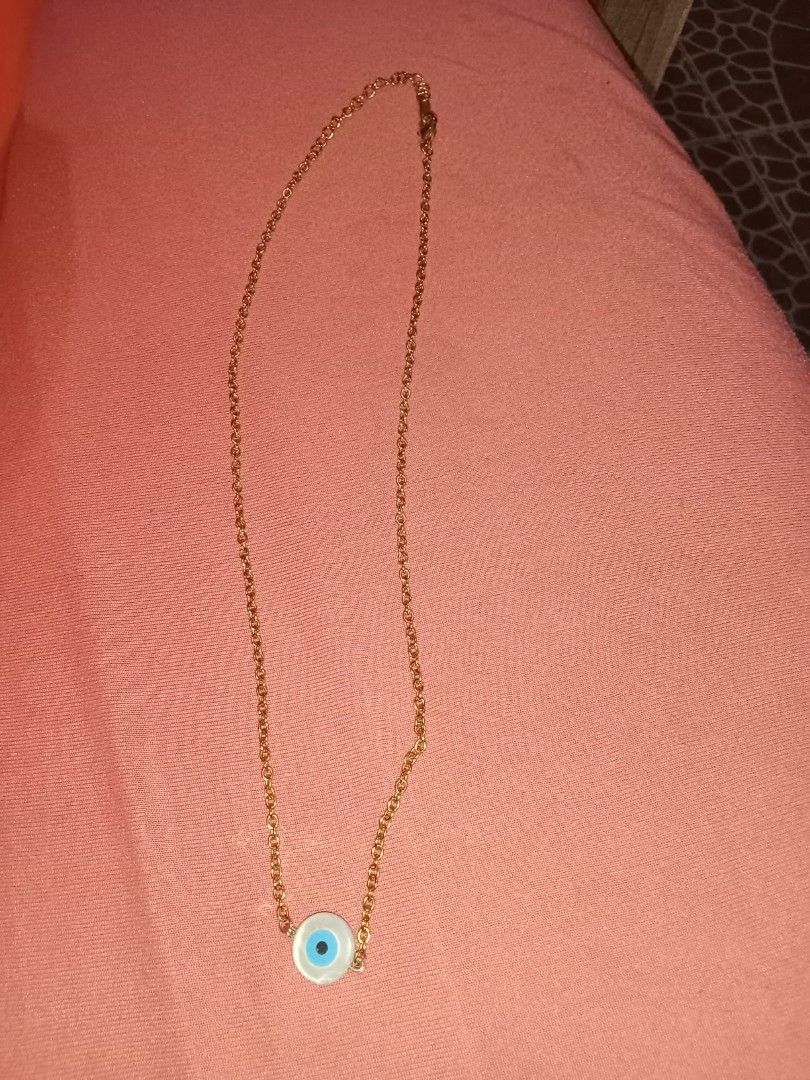 TALA by Kayla Evil Eye (chipped edge) (Category: Necklaces) located in Manila. Submitted by jamielynej15577 (Listing ID 1357289598, Image 2). Description: use once or twice. tapos tinago na sa box. may maliit na chipped part ung isang edge ng eye. this is bought from TALA by Kayla and hindi siya nangingitim kahit pagpawisan ka pa..