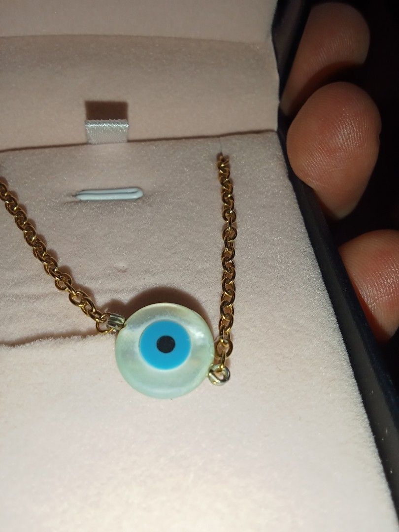 TALA by Kayla Evil Eye (chipped edge) (Category: Necklaces) located in Manila. Submitted by jamielynej15577 (Listing ID 1357289598, Image 1). Description: use once or twice. tapos tinago na sa box. may maliit na chipped part ung isang edge ng eye. this is bought from TALA by Kayla and hindi siya nangingitim kahit pagpawisan ka pa..