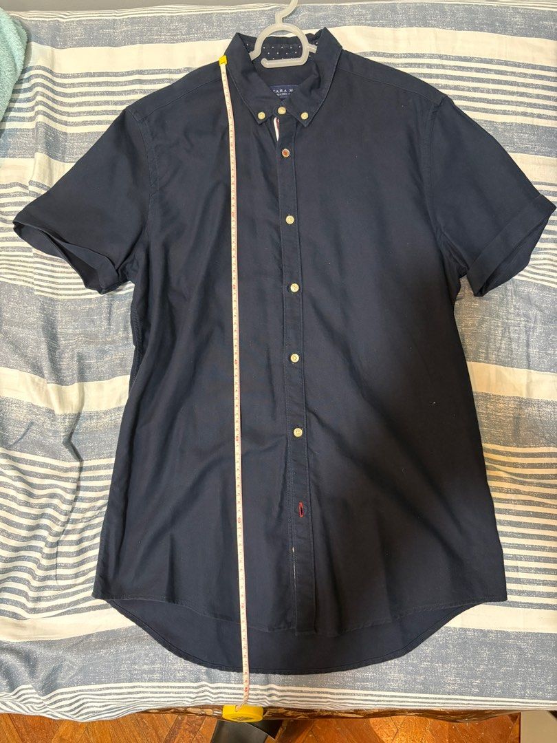 Zara Polo (Category: Tshirts & Polo Shirts ) located in Paranaque City. Submitted by Judee (Listing ID 1357282008, Image 3). Description: For Sale. Zara navy blue short sleeve polo Size: S Length: 78cm Width: 45cm CHECK OUT MY PROFILE FOR OTHER APPAREL YOU MAY LIKE.