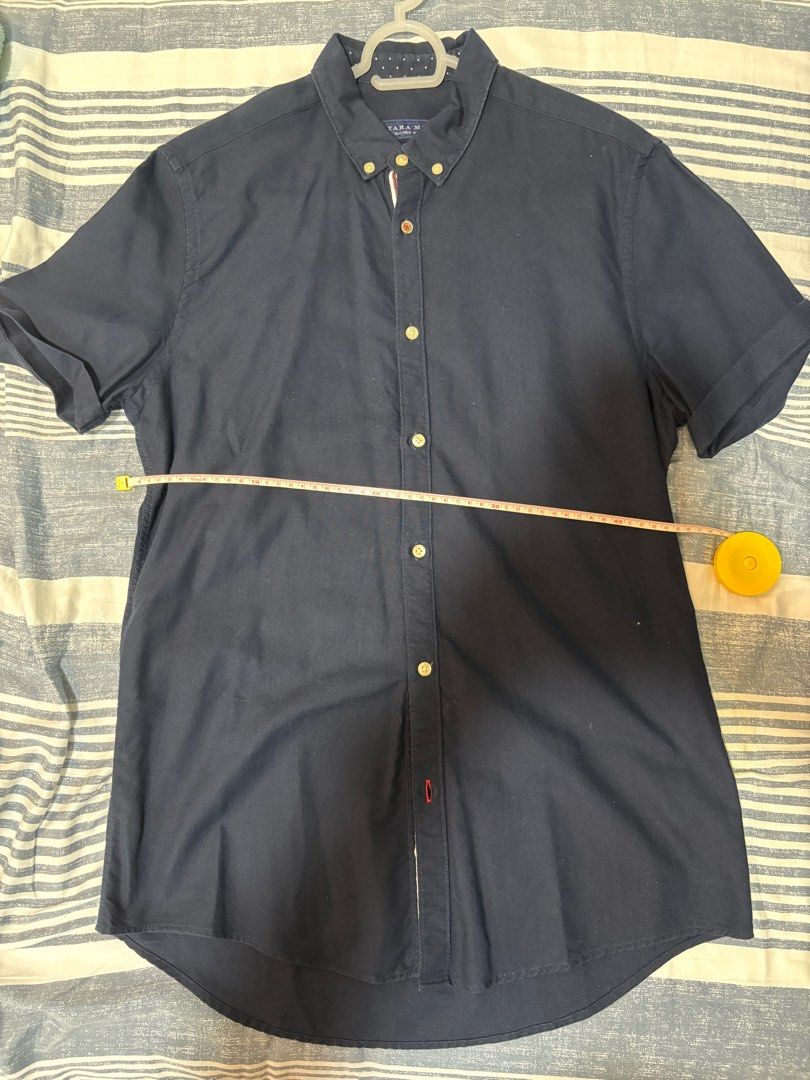 Zara Polo (Category: Tshirts & Polo Shirts ) located in Paranaque City. Submitted by Judee (Listing ID 1357282008, Image 2). Description: For Sale. Zara navy blue short sleeve polo Size: S Length: 78cm Width: 45cm CHECK OUT MY PROFILE FOR OTHER APPAREL YOU MAY LIKE.