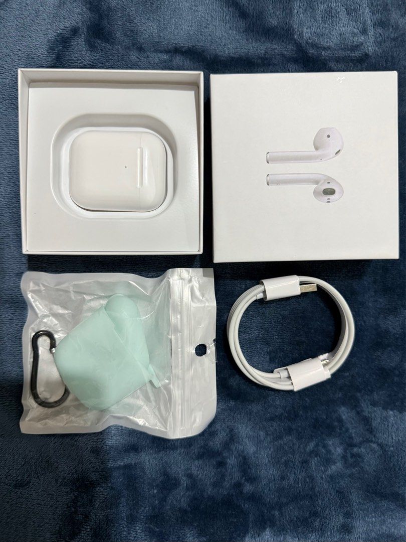AirPods 2 (Category: Earphones) located in Quezon City. Submitted by shemboti (Listing ID 1361464596, Image 2). Description: READ CAREFULLY ❗️ PREMIUM COPY of AirPods Gen 2 Brand new COMPLETE (box, manuals, cable) With FREE case PS: Sound quality is okay. Do not expect having the same quality as the original. Touch feature is working..