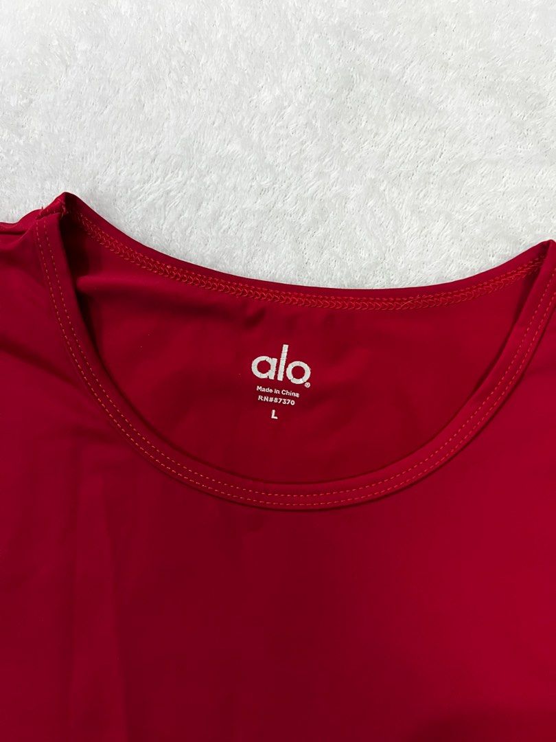 Alo Yoga Red Croptop (Category: Others Tops) located in Quezon City. Submitted by ellastore (Listing ID 1361468732, Image 1). Description: Large on tag Minimal logo crack Super lightweight fabric Really nice pa.
