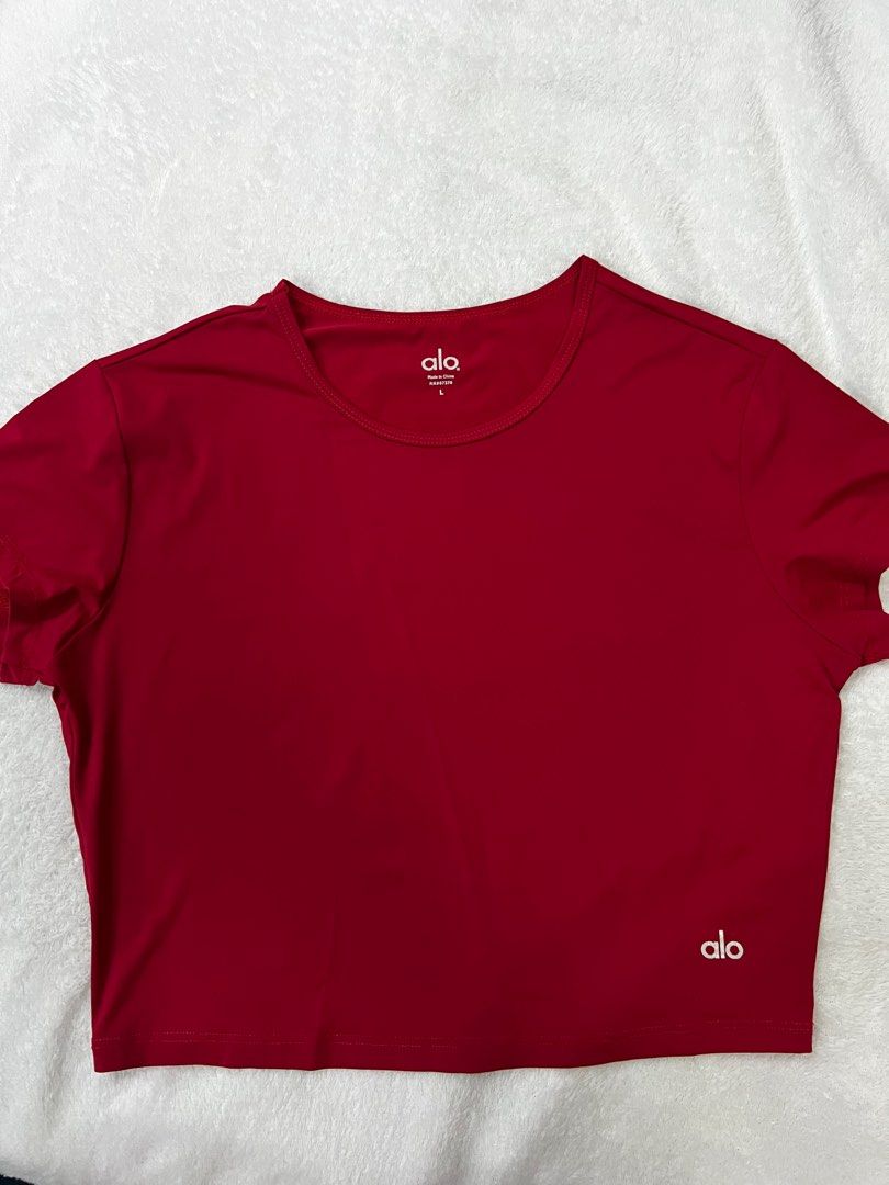 Alo Yoga Red Croptop (Category: Others Tops) located in Quezon City. Submitted by ellastore (Listing ID 1361468732, Image 3). Description: Large on tag Minimal logo crack Super lightweight fabric Really nice pa.