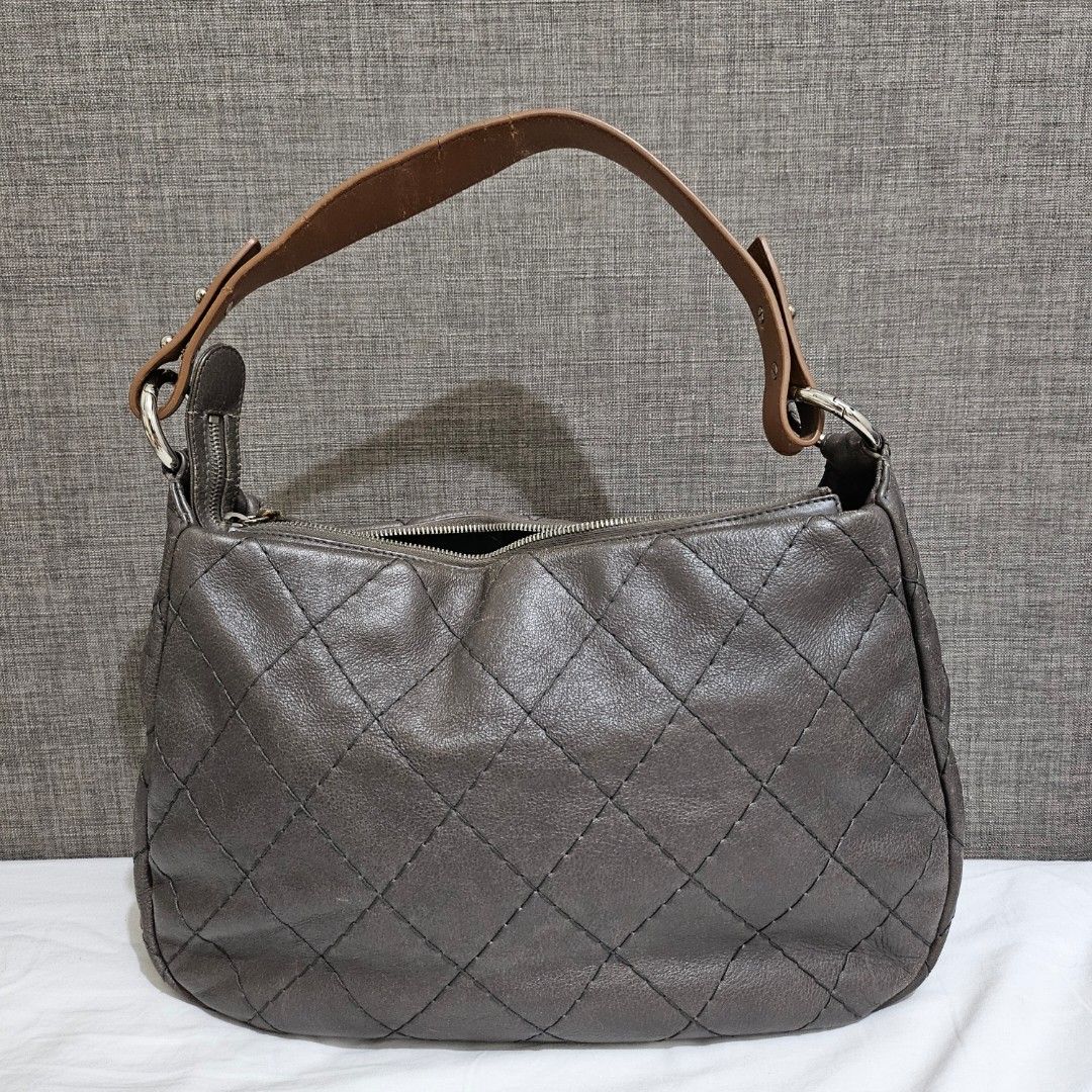 Chanel On the Road Hobo (Category: Luxury Bags & Wallets) located in Manila. Submitted by decluttering_account (Listing ID 1361467960, Image 2). Description: Chanel On the Road Hobo With dustbag and entrupy.