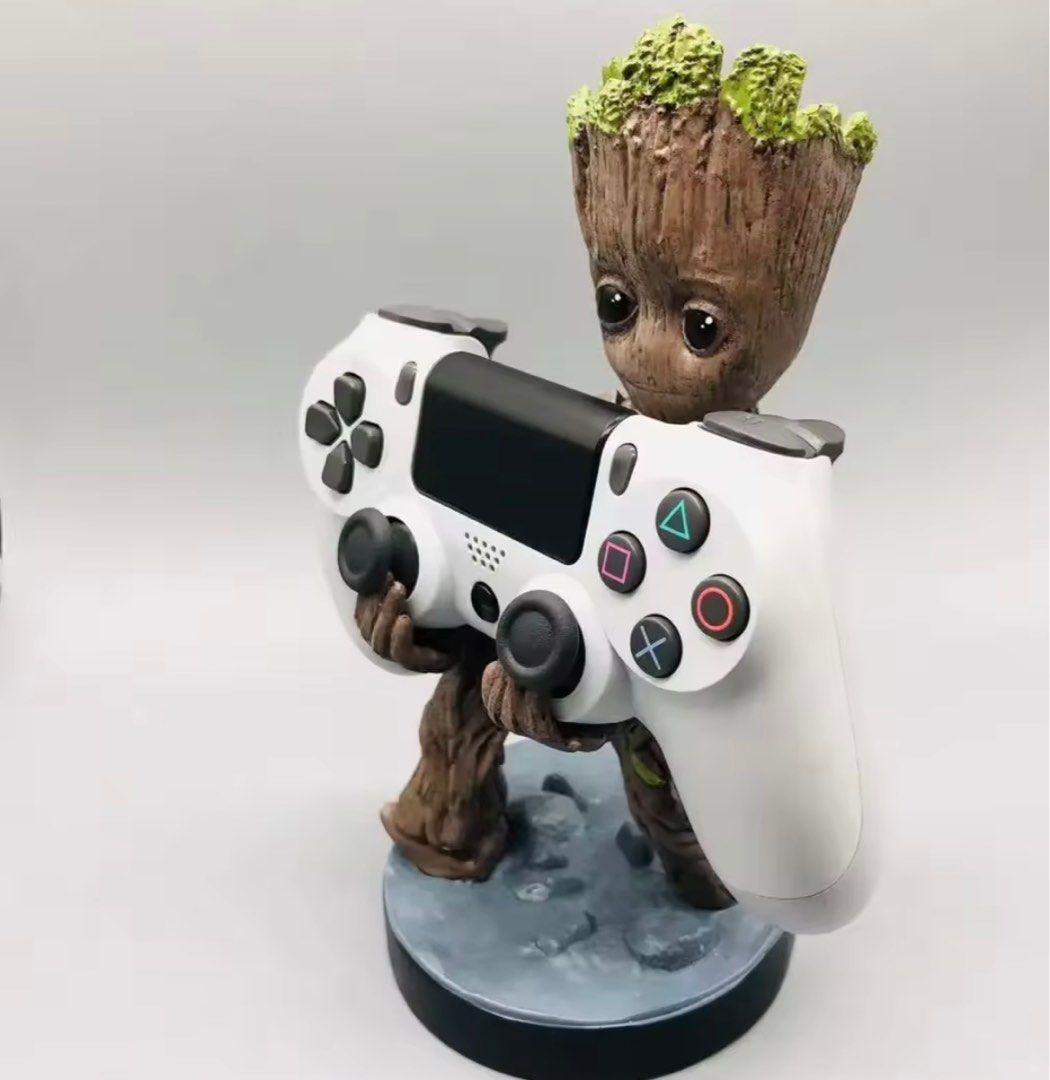 Groot Switch/Game Controller Handle (Category: Toy Figures) located in Singapore. Submitted by seelookandexplore (Listing ID 1361410160, Image 1). Description: Guardian of galaxy- Groot Can be used as switch holder or ps5 game controller etc. .
