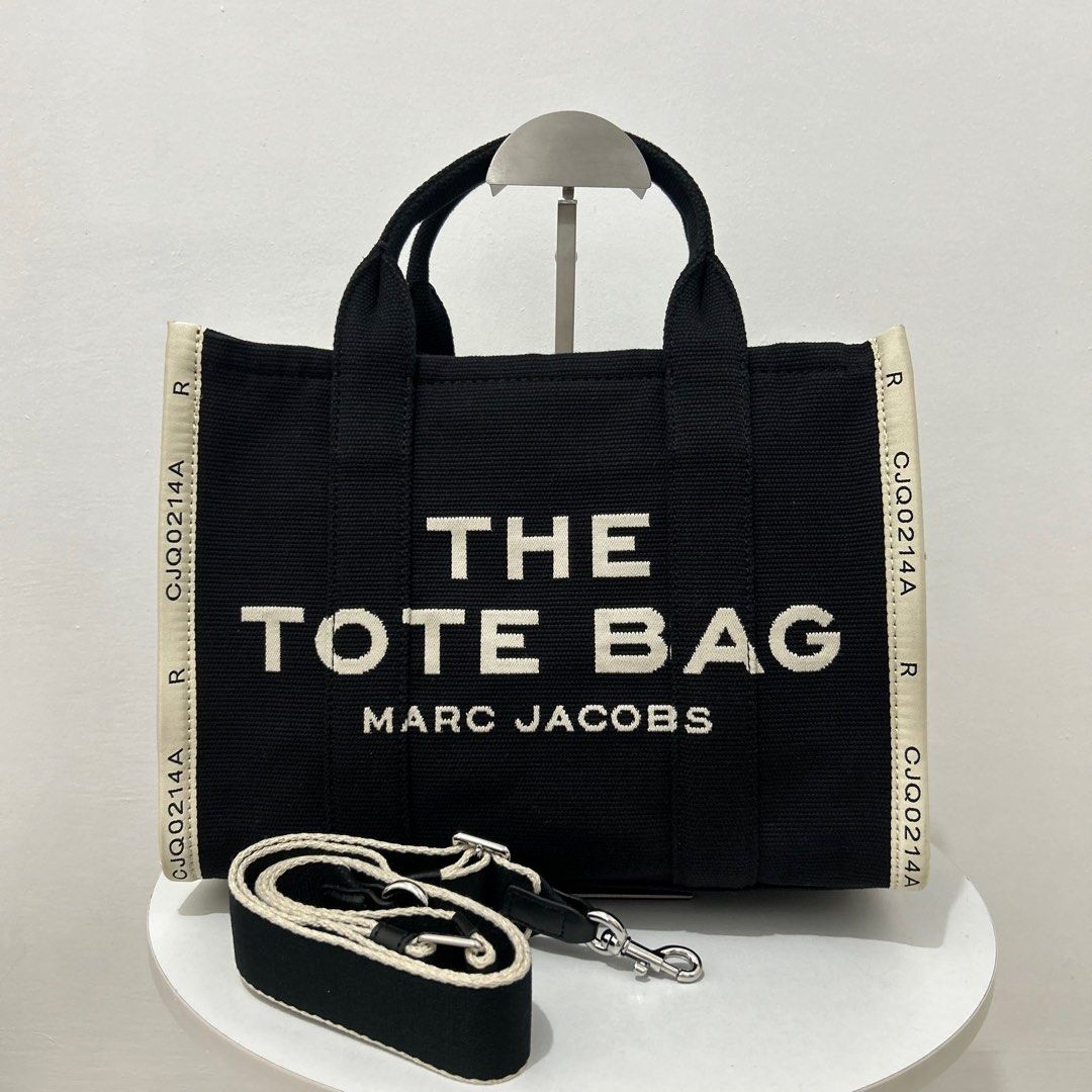 MJ - Marc Jacobs The Tote Bag Medium (Category: Luxury Bags & Wallets) located in Quezon City. Submitted by luxurybyluci (Listing ID 1361488325, Image 1). Description: Marc Jacobs The Tote Bag Medium Canvas Material Brandnew 100% Authentic.