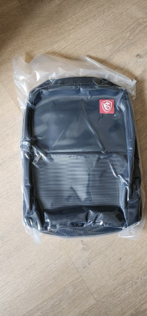 MSI 16" Laptop Backpack – The Sleek & Mysterious