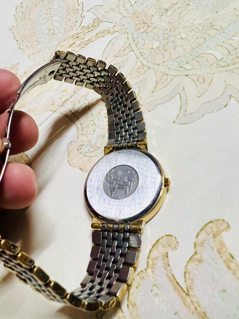Omega DeVille (Category: Luxury Watches) located in Paranaque City. Submitted by raemonmich (Listing ID 1361382914, Image 3). Description: Item description: OMEGA deville Reference Number 396.1012 Model OMEGA Product Key Features Bezel Color Gold Movement Quartz Indices Baton Indexes Band/Strap Bracelet Case Color Silver, Gold Caseback Solid Department Unisex Type Wristwatch Band Color Silver, Gold Band Material Stainless Steel, Gold Plated Bezel