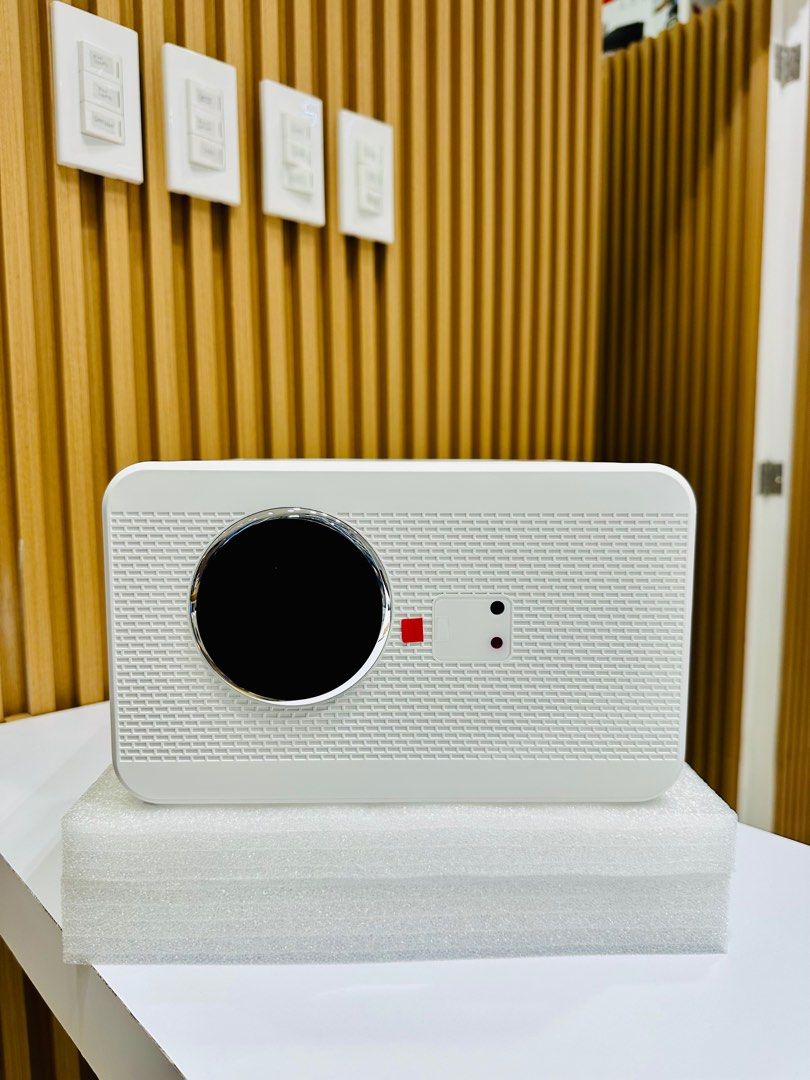 PTZ Projector Wifi6 Bt Dolby (Category: Projectors) located in San Juan City. Submitted by urbangiz_greenhillsmall (Listing ID 1361369969, Image 2). Description: Projection Specification: Display Technology: LCD Light Source: LED Projection Distance: 0.92 - 3.72(m) Projection Size: 30"-120" Physical Resolution: 1920*1080 Support Resolution: 4k,1080p,720p. Support Video format: AVI,MP4,MKV,MOV,3GP and Etc. Support Audio format: MP3,MP3,PC,Audiolay