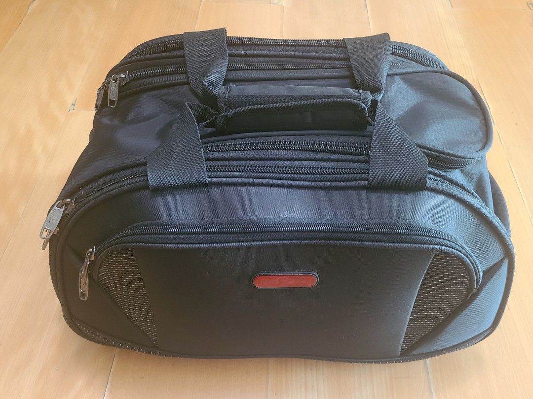 Racini hand carry luggage. (Category: Luggage) located in Taguig. Submitted by yeon0124 (Listing ID 1361386426, Image 1). Description: Racini hand carry luggage. two wheels, several pockets. - material: fabric like a bag. - Wight: 2kg. this is lighter than 4 wheels hand carry luggage. - no issue. - very good condition..