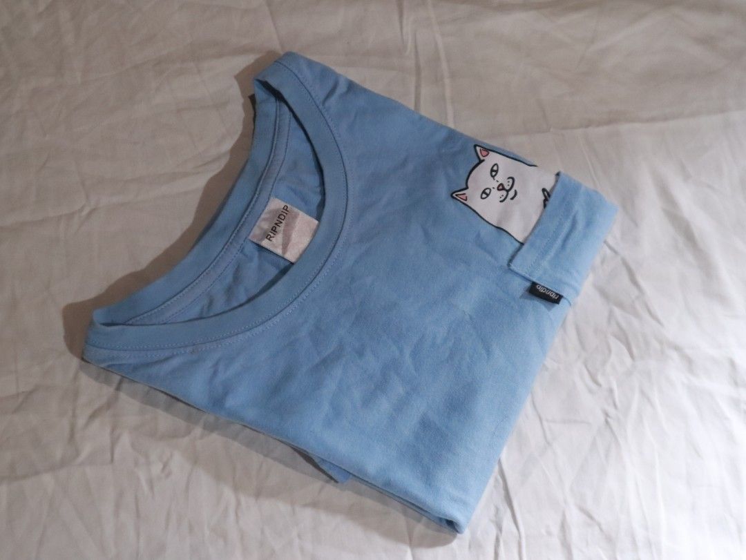 RIPNDIP Pocket T-Shirt Size Small (Category: Others Tops) located in Baao. Submitted by chuthriftph (Listing ID 1361394121, Image 3). Description: For Sale RIPNDIP Pocket T-Shirt Size Small No Issue As New Condition 350 only Om if Interested.