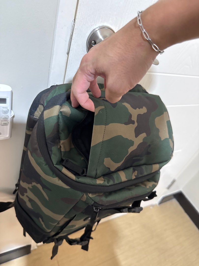 RVCA Camou Backpack (Category: Backpacks) located in Manila. Submitted by jpumpa (Listing ID 1361439746, Image 2). Description: With multiple pockets including laptop sleeve and 2 side pickets, frequently used.