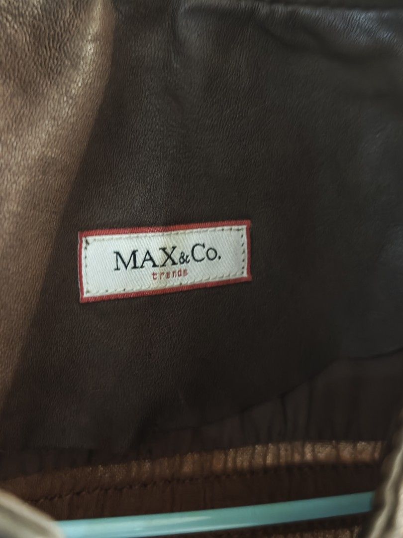 Vintage genuine leather jacket by Max&Co. (Category: Luxury Apparel) located in Antipolo. Submitted by maria0618 (Listing ID 1361449569, Image 2). Description: *Guaranteed authentic leather *Still smells genuine leather. *Brown (color may vary with the lighting *Max&Co. is an accessible luxury brand *Has minor flaws. *Fits small (can close the zipper) *Can fit medium with an open zipper *RFS: doesn't fit me anymore and decluttering *Payment first