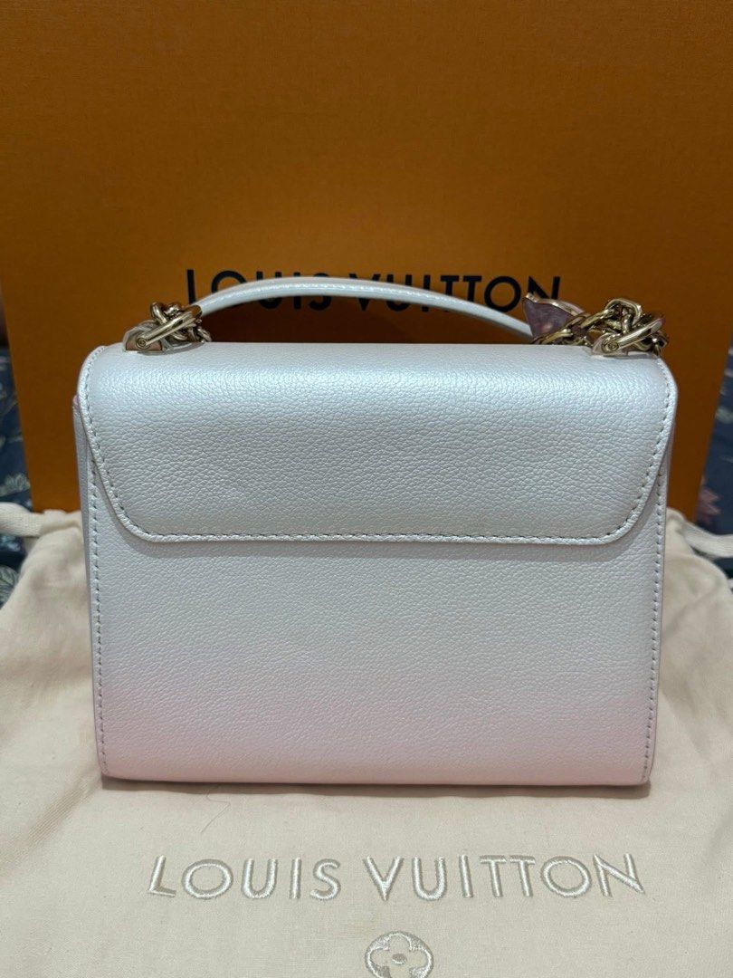 Authentic Lv Twist Pm Pink Dolphin (Category: Luxury Bags & Wallets) located in Quezon City. Submitted by jhaediah (Listing ID 1362959906, Image 2). Description: Twist Pm Pink Dolphin Rare Find Microchip code - 1.