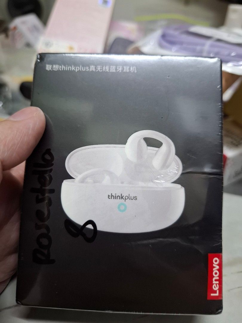 Lenovo earclips XT 83 (Category: Earphones) located in Singapore. Submitted by whrilygiftshop99 (Listing ID 1362918136, Image 1). Description: white earphone.