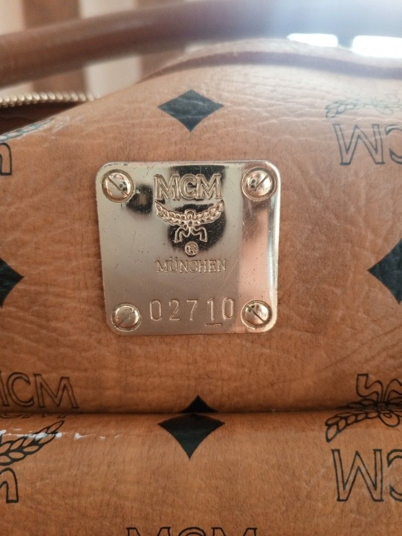 MCM cognac doctors bag handbag (Category: Luxury Bags & Wallets) located in Consolacion. Submitted by i.am.xs.or.s (Listing ID 1362902537, Image 2). Description: MCM munchen 02710 issue: leather coating fade scratches.