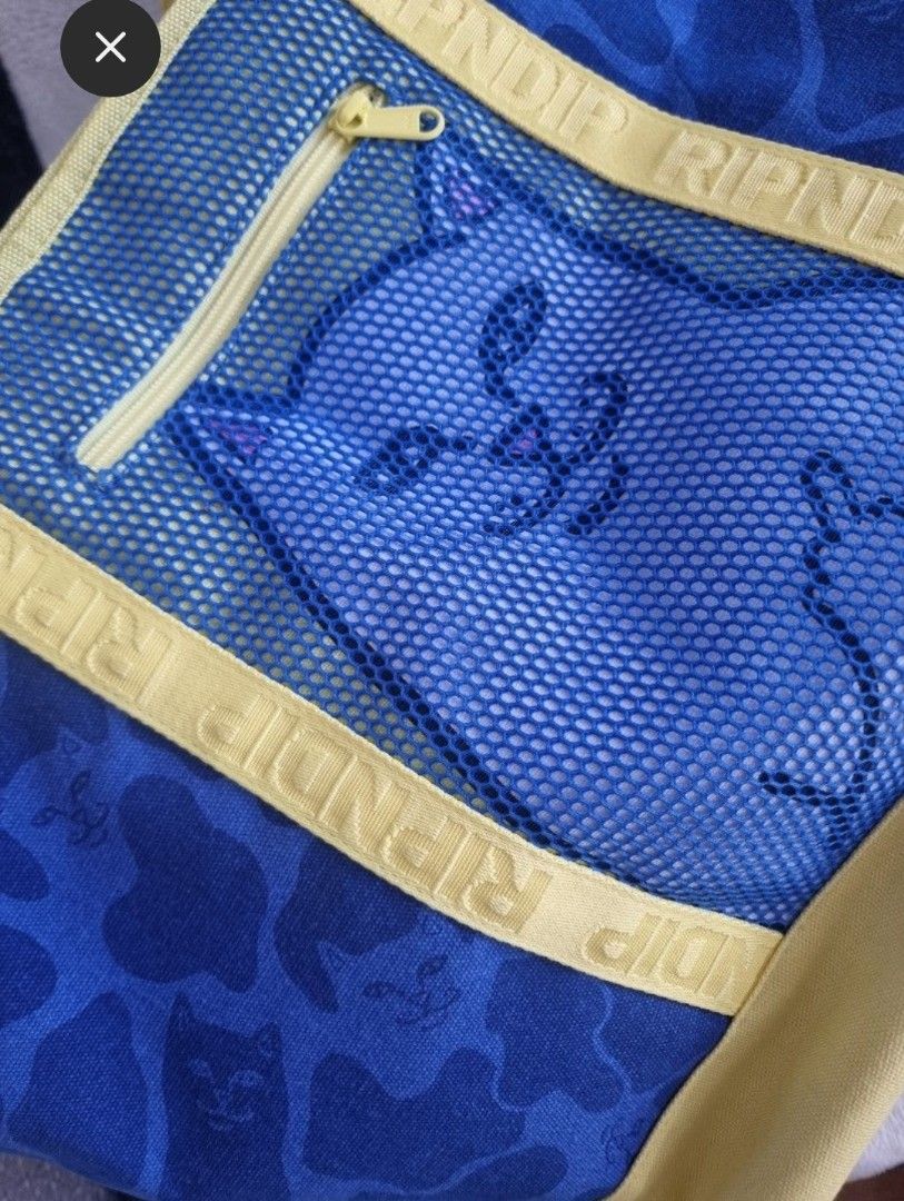 Ripndip Blue Camo tote bag (Category: Luxury Bags & Wallets) located in Batangas. Submitted by manuel.streetwearshop (Listing ID 1362952508, Image 2). Description: Brand New . Original. Tote Bag - 4500 MOP: Bank Transfer / Gcash Meet Up: Greenhills Mall or Ayala,Makati Shipping: Lalamove in Metro Manila Or LBC in provincial areas.