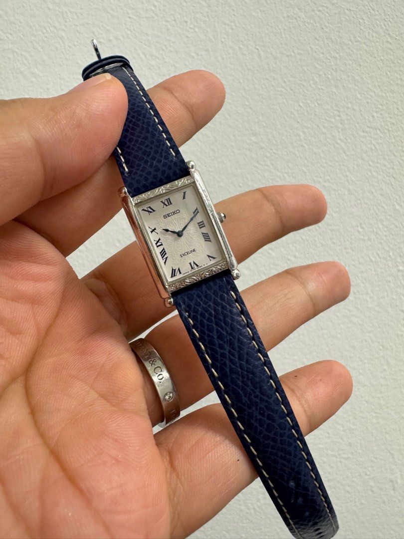 Seiko Ladies Tank Watch (Category: Women's Watches) located in Singapore. Submitted by sggreymarket (Listing ID 1362894099, Image 1). Description: Selling a Seiko Ladies Tank watch with blue hands. It's in lightly used condition. Watch only! We are open for interesting trades. We also accept credit card payments!.