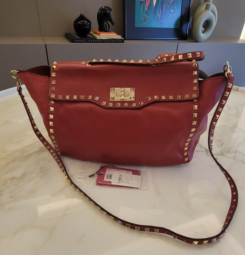Valentino Rockstud Single Handle Flap Tote Bag Red (Category: Luxury Bags & Wallets) located in San Juan City. Submitted by closetzoneph (Listing ID 1362887523, Image 1). Description: Preloved Valentino Rockstud Single Handle Flap Tote Bag Red P40,000 Valentino Women Ladies Female Gucci Prada Leather LV Louis Vuitton Second Hand Dior Hermes Shoulder Gold.