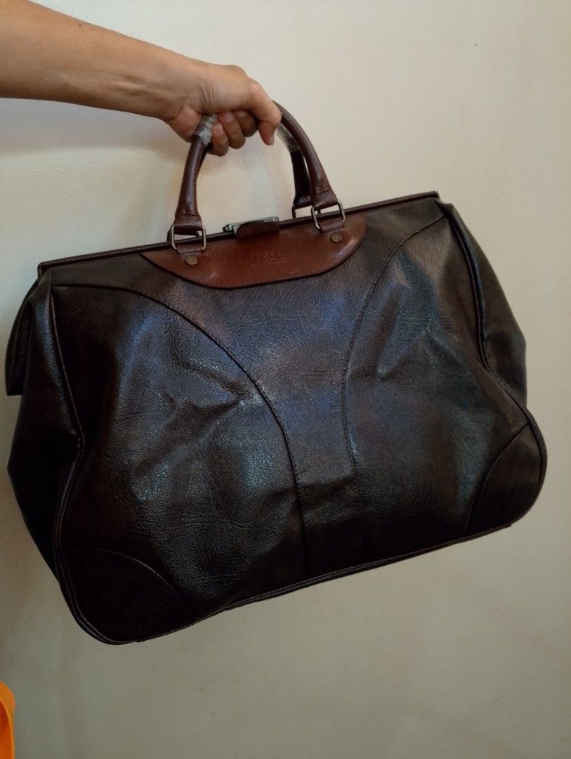 Vintage Soft Gladstone Doctors Bag (Category: Belt bags, Clutches and Pouches) located in Pasig City. Submitted by stufflikedat (Listing ID 1362929352, Image 2). Description: Vintage soft gladstone or doctor's bag Rabbik brand Japan 1980s classic soft faux & leather briefcase for doctors, lawyers, detailman, salesmen demo bag in excellent craftsmanship, two tone brown color, almost new with very light stains and scratches due to age but everythin