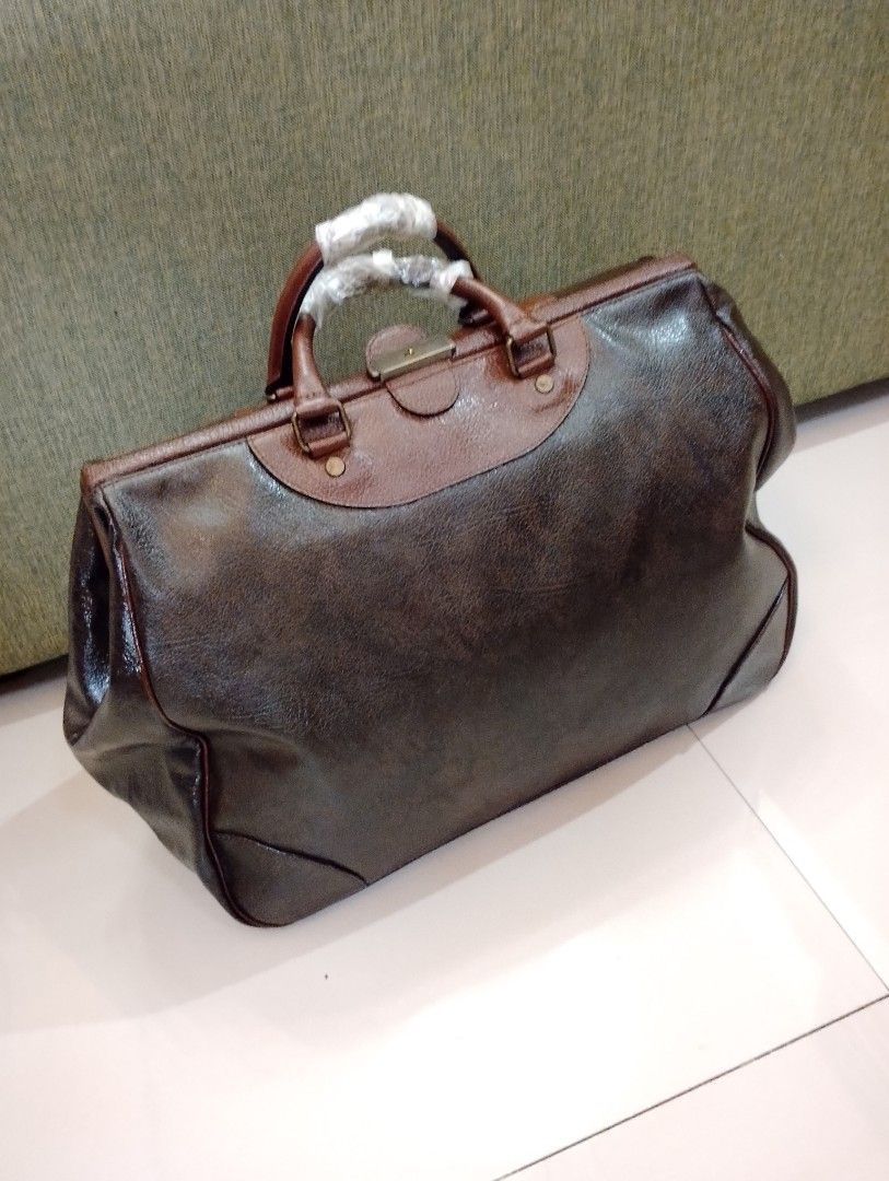 Vintage Soft Gladstone Doctors Bag (Category: Belt bags, Clutches and Pouches) located in Pasig City. Submitted by stufflikedat (Listing ID 1362929352, Image 3). Description: Vintage soft gladstone or doctor's bag Rabbik brand Japan 1980s classic soft faux & leather briefcase for doctors, lawyers, detailman, salesmen demo bag in excellent craftsmanship, two tone brown color, almost new with very light stains and scratches due to age but everythin