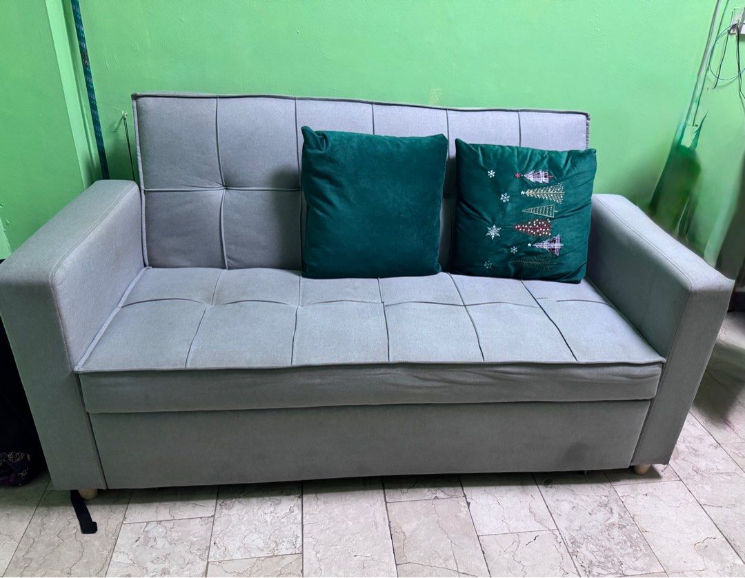 3 seater sofa bed (Category: Sofas) located in Pasig City. Submitted by f.abadilla (Listing ID 1363041410, Image 2). Description: Sofa bed with pull out and two pillows included and also sofa cover Made with fabric cover, wooden frame, and polyurethane foam. SOFA Width: 170 cm Depth: 91 cm Height: 90 cm BED Width: 153 cm Depth: 180 cm Height: 43 cm.
