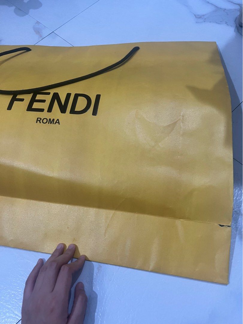 Authentic Fendi paperbag (Category: Luxury Bags & Wallets) located in Quezon City. Submitted by nxdeclutters (Listing ID 1347576895, Image 2). Description: RFS: Decluttering Negotiable See next pic for the issue Other authentic luxury paperbags available!.