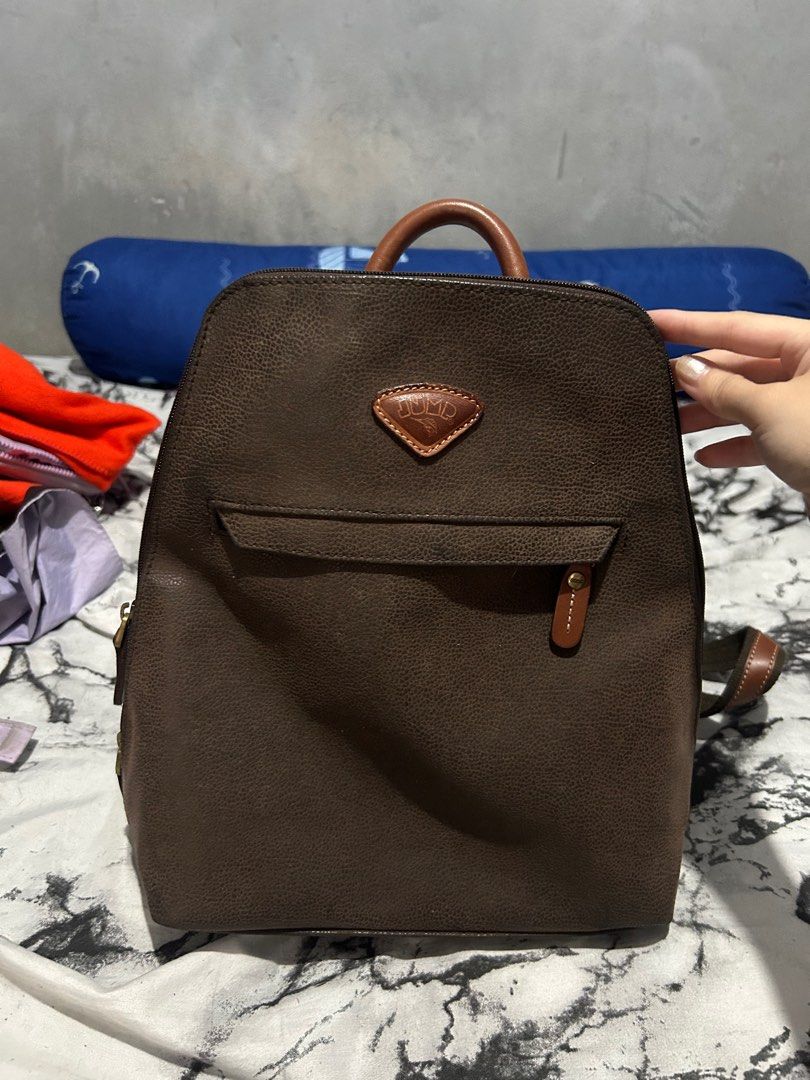 Brown Backpack (Category: Backpacks) located in Marikina City. Submitted by jenzitems (Listing ID 1363026814, Image 1). Description: Brown Backpack no flaws .