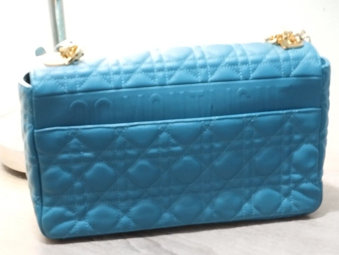 CD Caro Blue- Large (Category: Luxury Bags & Wallets) located in Rizal. Submitted by shoppin_craze (Listing ID 1363023457, Image 3). Description: Main composition: calfskin Lambskin and calfskin lining Flap closure with CD twist clasp Embossed 30 Montaigne signature on the back Adjustable, detachable CD chain link strap with Christian Dior Paris military-inspired buckle Two removable links with an X-shaped center notch allow the chain to be opene