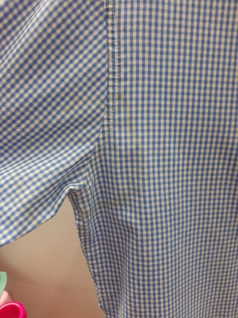 Cotton on checkered long sleeves (Category: Formal Shirts) located in Cabanatuan. Submitted by decluttercab (Listing ID 1363105828, Image 2). Description: has minor yellow stain (see 2nd pic).