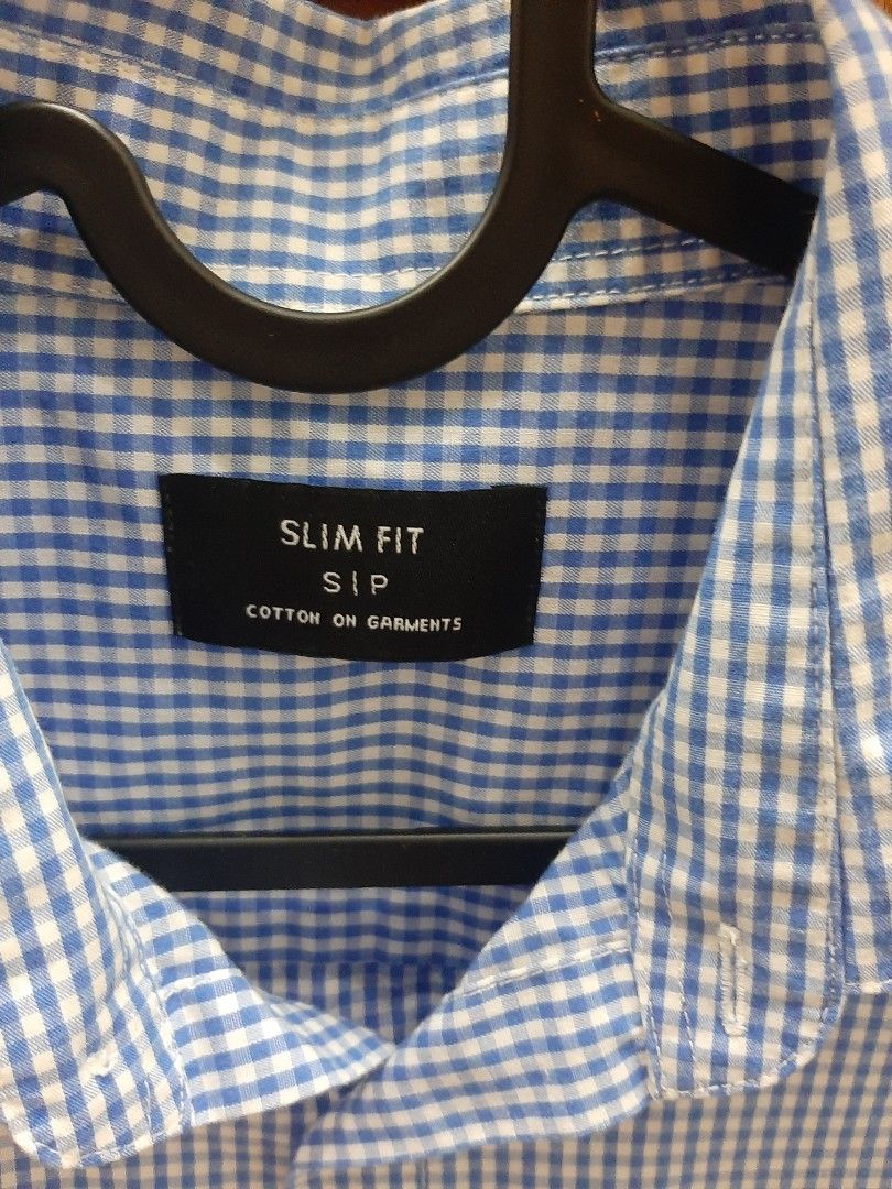 Cotton on checkered long sleeves (Category: Formal Shirts) located in Cabanatuan. Submitted by decluttercab (Listing ID 1363105828, Image 3). Description: has minor yellow stain (see 2nd pic).