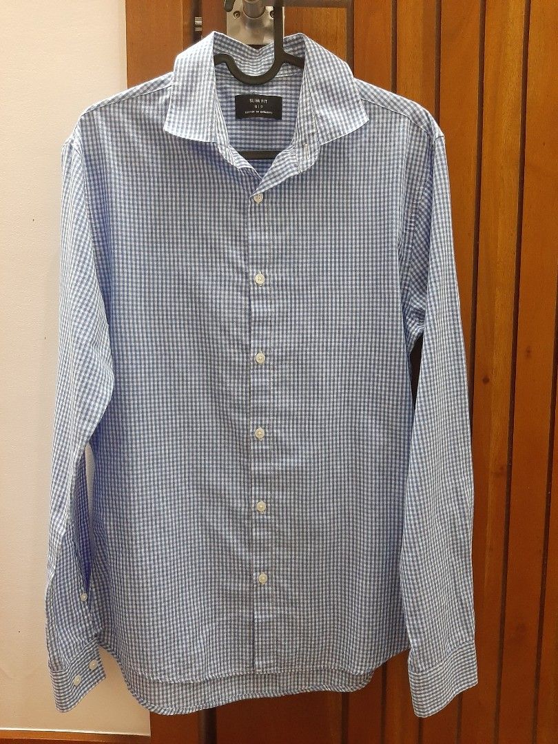 Cotton on checkered long sleeves (Category: Formal Shirts) located in Cabanatuan. Submitted by decluttercab (Listing ID 1363105828, Image 1). Description: has minor yellow stain (see 2nd pic).