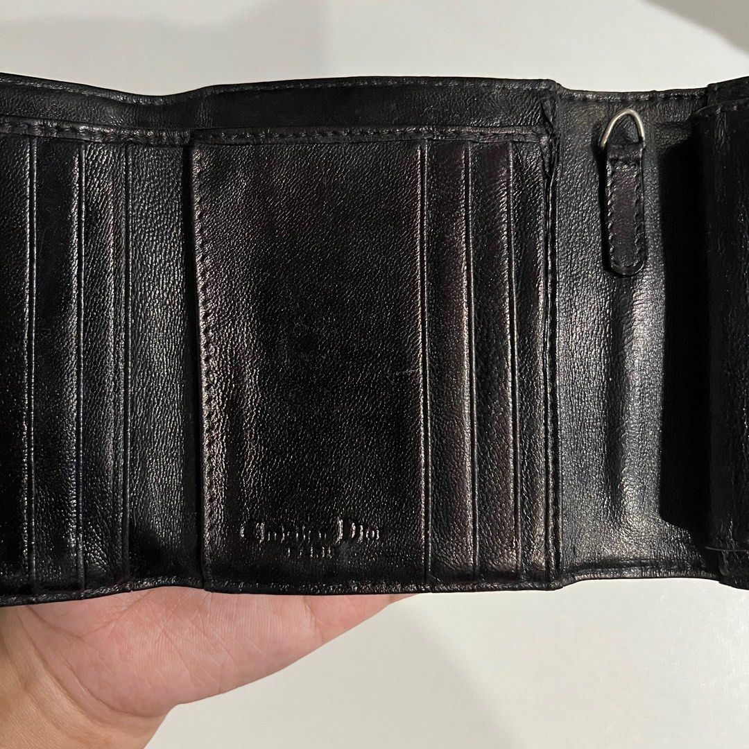 Dior Wallet (Category: Wallets & Card holders) located in Mandaluyong City. Submitted by mtotc (Listing ID 1363052379, Image 2). Description: Dior Wallet - Bought this from Carousell for 2,500 - Authentic - Minor flaws, just creasing, in good condition.