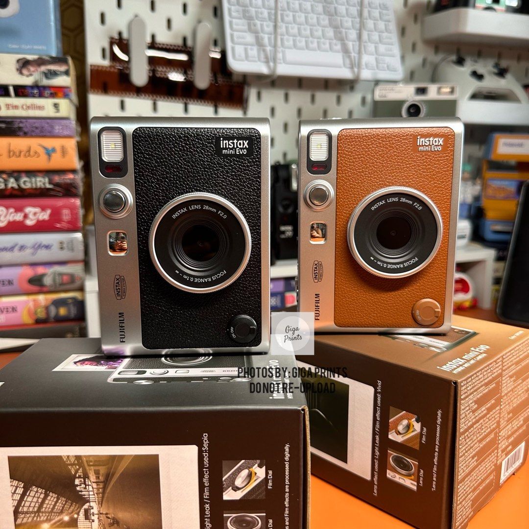 Instax Mini Evo Instant Camera (Category: Cameras) located in Quezon City. Submitted by bdsdc1998 (Listing ID 1363059441, Image 1). Description: INSTAX MINI EVO INSTAX CAMERA AND PRINTER 🖤🤎 🎁Bundle A: 12,999 -Unit With 10s Plain Film 🎁Bundle B: -Unit With 10s Plain Film and Clear Case 🎁Bundle C: -Unit With 10s Plain Film and Leather Case 💝Unit Inclusions: -Camera -32GB SD Card -Shoulder Strap -Usb Cable -Users Manual -Warranty Papers (1Year