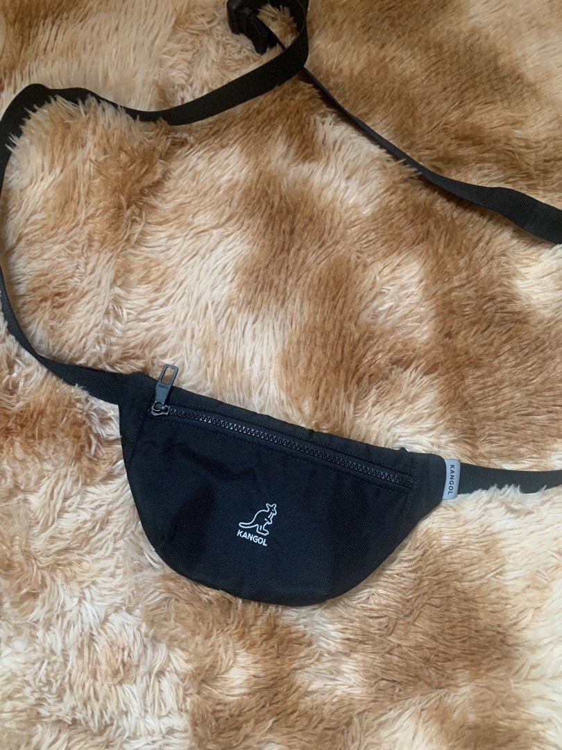 Kangol Crossboy/Belt bag Original (Category: Belt bags, Clutches and Pouches) located in Quezon City. Submitted by gamitnirod (Listing ID 1363144124, Image 3). Description: Brand: Kangol (Original) Color: Black (Deep black in person) Issue: NONE! Pristine condition Other info: -Zippers are engraved with Kangol logo -Zippers are working smooth -Tags are complete -Very durable -Adjustable strap -2 pockets, 1 mesh pocket inside -Already washed and r