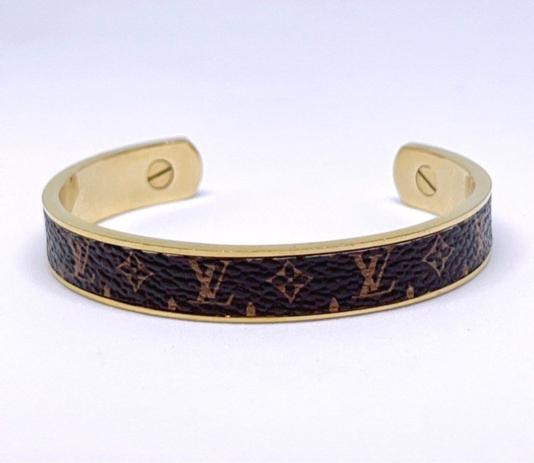 LOUIS VUITTON MONOGRAM CUFF BANGLE BRACELET (Category: Bracelets) located in Taguig. Submitted by rich0301 (Listing ID 1363041001, Image 1). Description: Inspired Louis vuitton monogram cuff bangle bracelet Preloved In good condition No inclusions Small to medium only .