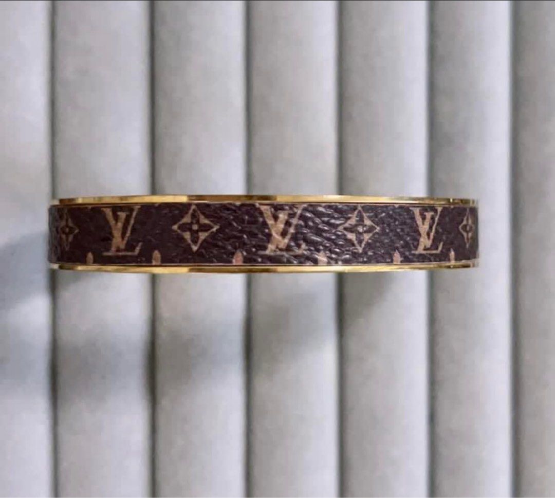 LOUIS VUITTON MONOGRAM CUFF BANGLE BRACELET (Category: Bracelets) located in Taguig. Submitted by rich0301 (Listing ID 1363041001, Image 2). Description: Inspired Louis vuitton monogram cuff bangle bracelet Preloved In good condition No inclusions Small to medium only .