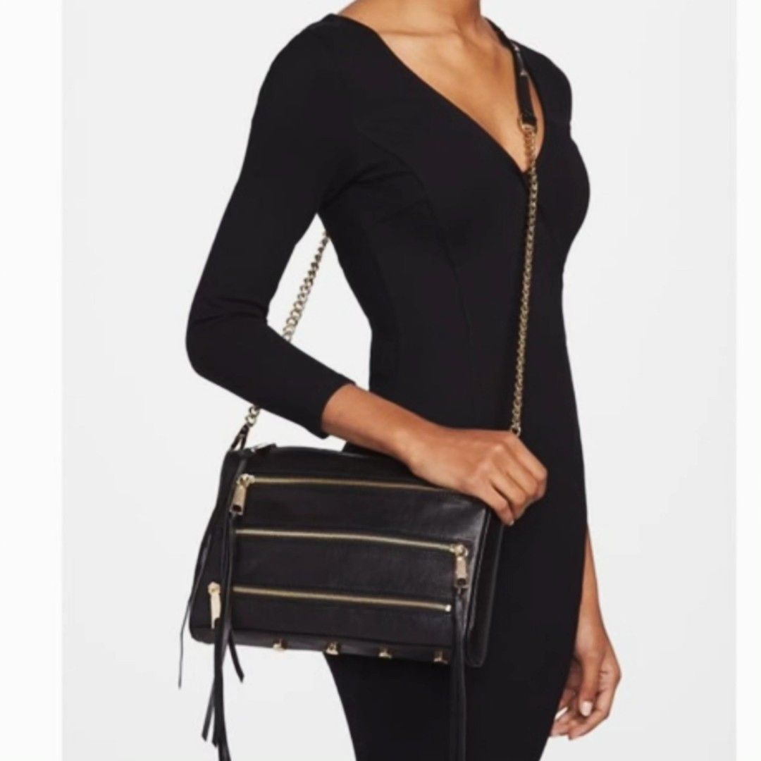 Original Rebecca Minkoff 5 Zip Studded Crossbody bag (Category: Cross-body Bags) located in Quezon City. Submitted by chph1st (Listing ID 1363060997, Image 1). Description: measurement 28x4x20. 5 zip compartments. good condition with minimal flaws. tiny hole on the lining. not obvious when worn..