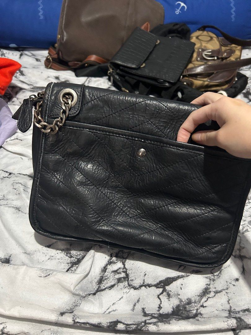 YSL Black Bag (Category: Shoulder Bags) located in Marikina City. Submitted by jenzitems (Listing ID 1363027332, Image 2). Description: Bought in ukay. Kinda heavy. Good Conditions..