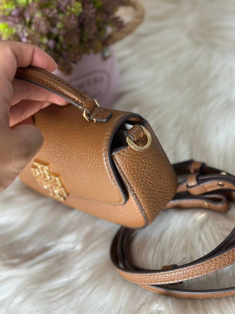 Authentic Tory Burch Britten Mini Top Handle Crossbody bag (Category: Luxury Bags & Wallets) located in Quezon City. Submitted by jhaediah (Listing ID 1363316509, Image 2). Description: bnew kasya promax authentic.