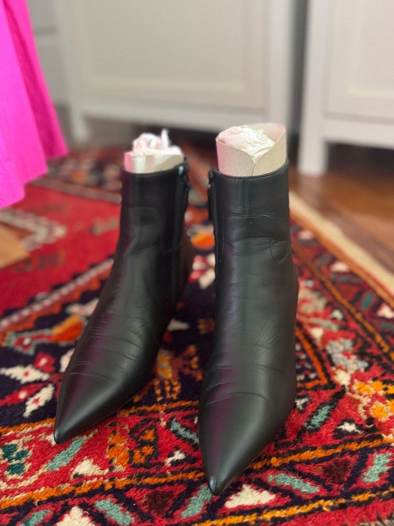 Balenciaga low-heel ankle boots (Category: Sneakers & Footwear) located in Davao. Submitted by kitdlr (Listing ID 1363188722, Image 3). Description: Unworn. Not my size. Suited for narrow feet. Looking for new home of this beautiful pair of leather shoes hence selling really low. The price is already a very good bargain. You won’t get this price elsewhere for the brand and quality. Originally white (see photo) but had it colored emerald green and