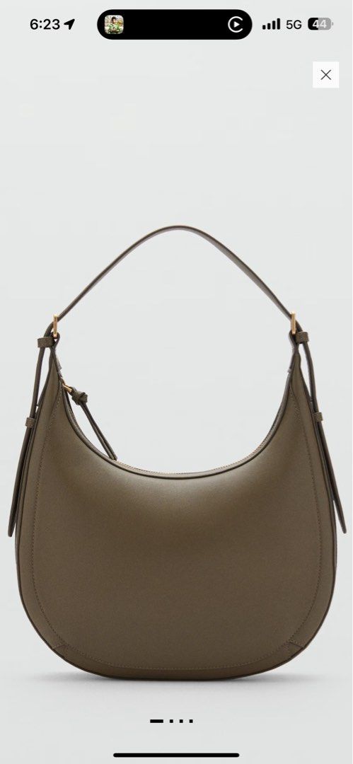 MANGO OVAL SHOULDER BAG (Category: Luxury Bags & Wallets) located in Muntinlupa City. Submitted by hannahbeeee (Listing ID 1363274496, Image 1). Description: Used only twice Spacious inside Description: Solid tone oval Shaped faux leather shoulder bag Polyurethane Zip Closure Lined interior 1 main zip compartment 1 interior zip pocket Adjustable single grab handle Dimensions: L31cm x H26cm x W9cm With paper bag and Tag.